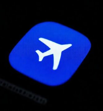 Un icono de iPhone en azul y blanco